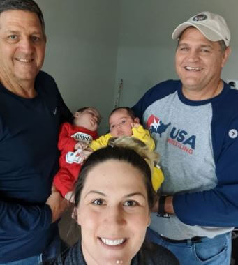 George Gray with his twin brother, daughter Adeline Gray and grandchildren.